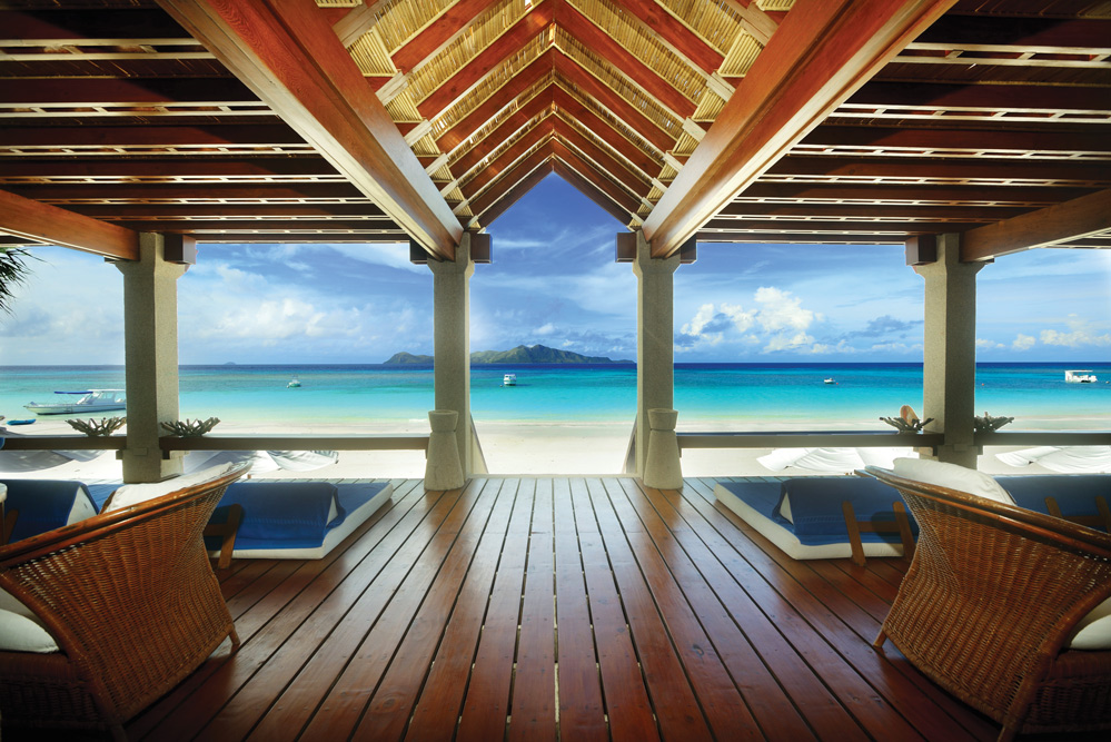 The cerulean sky and turquoise sea as seen from the beach club at Amanpulo in the Philippines